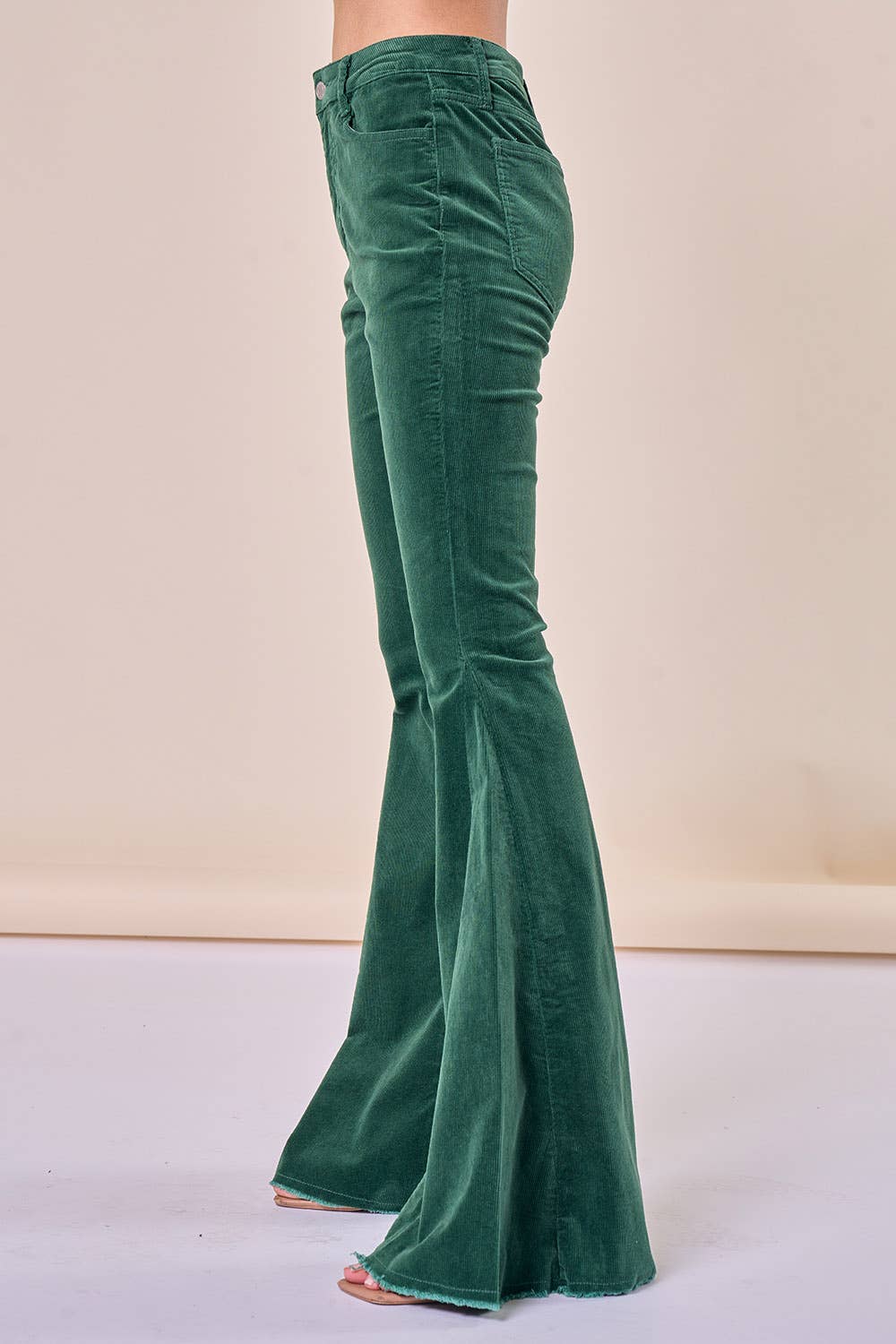Saints & Hearts: HUNTER GREEN CORDUROY FLARES DISTRESSED HEM