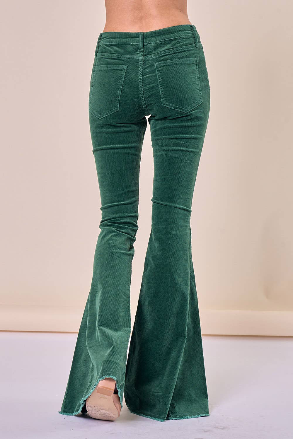 Saints & Hearts: HUNTER GREEN CORDUROY FLARES DISTRESSED HEM